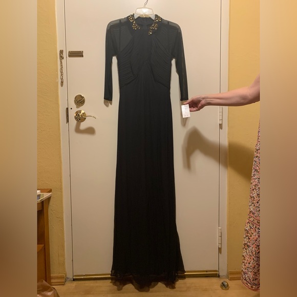 Black gown, long sleeve, stretch sheer sleeves, and rhinestone collar. - Picture 4 of 7